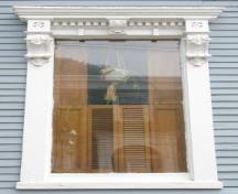 This photograph shows one of the windows with high ornamentation, 2007; City of Saint John