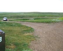 View southwest at rubbing stone and surrounding area, 2004.; Government of Saskatchewan, Michael Thome, 2004.