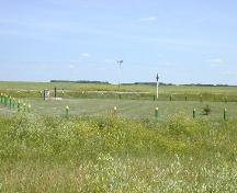 Looking southeast at Historic Site and cart tracks, 2004.; Government of Saskatchewan, Marvin Thomas, 2004.