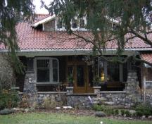 Featured is the fieldstone veranda with granite posts.; Kayla Jonas, 2007.
