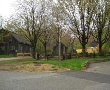 Of note is the Bradley House's setting beside the barn to the far left and drive shed.; Paul Dubniak, 2008.