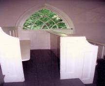Showing balcony pews and Gothic window; Private Collection