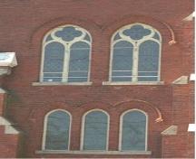 Featured are stained glass windows with brick voussoirs.; Town of Milton, ND.