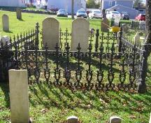 A family burial plot surrounded by a wrought iron fence in Zion United Church Cemetery, Liverpool, Queens County, NS.; NS Dept. of Tourism, Culture & Heritage, 2009