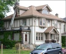 Of note is the hip roof with two dormers displaying stucco and half-timbering.; City of Brantford, 2009.