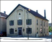Of note is the symmetrical three-bay facade divided by pilasters.; City of Brantford, n.d.