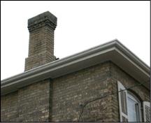Featured is the cornice and the corbelling on the chimney.; City of Brantford, nd.