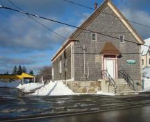 This is a photo of the North Head Show Hall taken in winter 2010.  The Farmer's Market stalls are on the left and the Church of Ascension Anglican Church Hall in on the hill behind the Show Hall.  ; Grand Manan Historical Society, 2010
