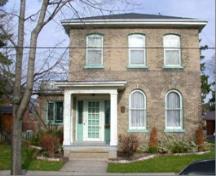 Of note is the low hip roof and arched windows with brick voussoirs.; City of Brantford, n.d.