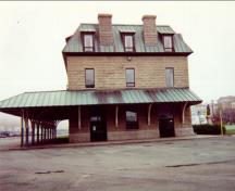 General view of the side elevation of the Newfoundland Railway Headquarters National Historic Site of Canada terminus building, 1997.; Public Works and Government Services Canada / Travaux publics et Services gouvernementaux Canada, 1997.