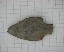 Fluted point artifact found at Debert, N.S.; Courtesy of the Confederacy of Mainland Mi'kmaq, 2007.