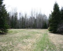 Showing approach to cemetery in wooded area; Province of PEI, Donna Collings, 2009
