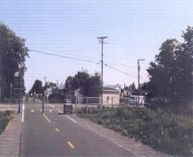 General view of the bicycle trail built over the former train tracks, 1999.; Olivier Larochelle, Parks Canada Agency / Agence Parcs Canada, 1999.
