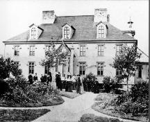 Front Facade of St. Michael's Convent, St. John's, showing Bishop Thomas Power on his first visit to Belvedere on or about Sept. 9, 1870, the day of his arrival in Newfoundland.  ; HFNL 2005