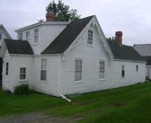 This photograph illustrates the side view of the Boone Residence, 2009; Town of St. Andrews