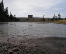 Indian Beach has a natural seawall on which the aboriginal fisherman huts were built. This image is taken from the inner shore of Indian Beach pond looking out to the seawall.; Larry Small 2009