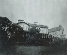 Image of the Marathon Inn taken from the western side looking east. The Captains Quarters are attached to the Annex and the Main Inn by a large boardwalk.  ; Grand Manan Archives Photo Collection