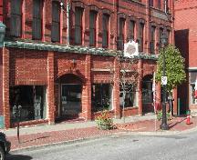 This photograph shows the storefront of the building and the four pilasters between all of the 2nd floor windows, 2004.
; City of Saint John