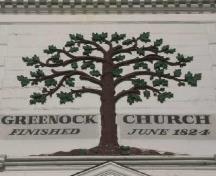 This photograph shows the Green Oak, representing Greenock, Scotland; Town of St. Andrews