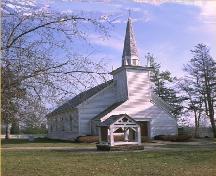 View of the main entrance to Her Majesty's / St. Paul's Chapel of the Mohawks, showing the tower and steeple rising from the front entry porch.; Parks Canada Agency / Agence Parcs Canada.