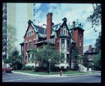 General view of the John R. Booth Residence, showing the prominent location on a corner lot, 1982.; Parks Canada Agency/ Agence Parcs Canada, 1982.