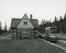 Side view of Building 1, showing the half-timbering featured on the upper half of the building, 1985.; Parks Canada Agency / Agence Parcs Canada, 1985.