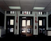 Interior view of Building 29, showing the regular fenestration pattern, 1994.; Department of National Defence / Ministère de la Défense nationale, 1994.