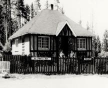 Historic façade of the Upper Hot Pool Residence, showing its fusion of English Arts and Crafts design elements with rustic materials and craftsmanship.; Parks Canada Agency / Agence Parcs Canada.