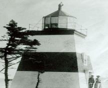 Photographie historique du phare à Margaretsville, 1890.; Parks Canada Agency / Agence Parcs Canada, 1990.
