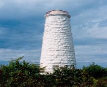 General view of the Tower at Christian Island, showing its picturesque silhouette, 1990.; Canadian Coast Guard / Garde côtière canadienne, 1990.