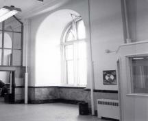 View of a window from the inside of Postal Station 'A', 1983.; Parks Canada Agency/Agence Parcs Canada, C. Cameron, 1983.