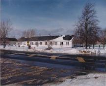 General view of Building 2, showing the south façade, 1993.; Ministère de la Défense Nationale / Department of National Defence, ND. CSC. 93-019-16, 1994.