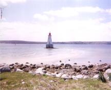 General view of the Sandy Point Lighthouse, June 2000.; Public Works and Government Services Canada / Travaux publics et Services gouvernementaux Canada, 2000.