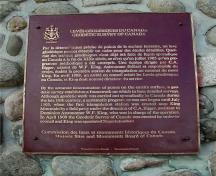General view of the plaque erected by the Historic Sites and Monuments Board of Canada commemorating the location of the First Geodetic Survey Station.; Parks Canada Agency / Agence Parcs Canada, n.d.