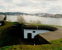 General view of Fort Rodd Hill, showing the integrity of topographical land forms and vegetation strategically linked to the setting of individual structures and batteries, 1997.; Parks Canada Agency/Agence Parcs Canada, J. Mattie, 1997.