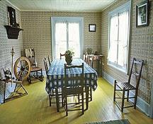 View of the interior of the Sir Wilfrid Laurier house depicting the dinning room, 1982.; Parks Canada Agency / Agence Parcs Canada, F. Cattroll, 1982.