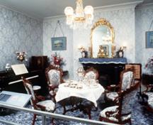 Interior view of the Sir George-Étienne Cartier National Historic Site of Canada, showing the surviving original interior decoration with its architectural woodwork and its distinction between private and public rooms, 1989.; Parks Canada Agency/Agence Parcs Canada, 1989.