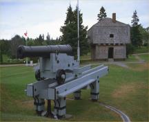 General view of St. Andrews Blockhouse, appearing in the background, 1987.; Parks Canada Agency / Agence Parcs Canada, 1987.