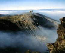 General view of Signal Hill, showing the 106-hectare Signal Hill landscape with its steep seaside cliffs.; Parks Canada Agency/Agence Parcs Canada.