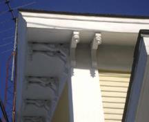 This photograph shows the decorative brackets below the eaves, 2009; Town of St. Andrews