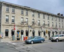 Side view of the Former Geological Survey of Canada Building showing the even, regularly placed door and window openings with distinct classical decorative trim identifying each storey, 2011.; Parks Canada Agency / Agence Parcs Canada, M. Therrien, 2011.