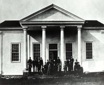 This historic image shows the building in 1901; Queens County Heritage Collection
