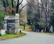 General view of Mount Pleasant Cemetery, showing the winding paths, avenues, and bridges in their routes and extent.; Parks Canada Agency / Agence Parcs Canada.