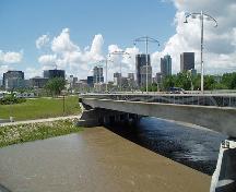 General view of The Forks, showing viewscapes east and west along course of the Assiniboine River, 2008.; Winnipeg Skyline from Bridge, Adam DeClercq, 2008.