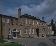 General view of Government House, showing the brick and stone construction materials, 1983.; Parks Canada Agency / Agence Parcs Canada, 1983.