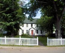 Showing setting of house with spacious grounds and picket fence; City of Charlottetown, Natalie Munn, 2005