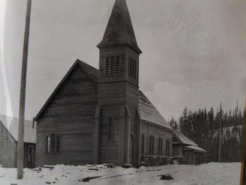 St. Andrew's United Church, front view in winter, historic image.