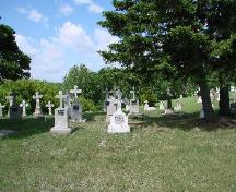 View of a few graves at St. Mary's Ukrainian Orthodox Church, 2008.; Brett Quiring, 2008.