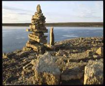 General view from Igloolik Island showing an inukshuk.; Parks Canada Agency / Agence Parc Canada