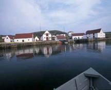 General view of Battle Harbour Historic District, showing the wooden wharves and boardwalks, 2003.; Parks Canada Agency/Agence Parcs Canada, J. McQuarrie, 2003.